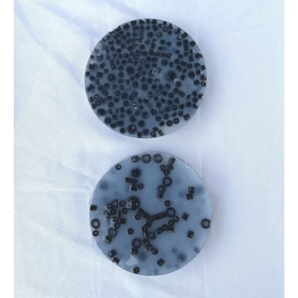 Two picky pads made with all-black pebbles