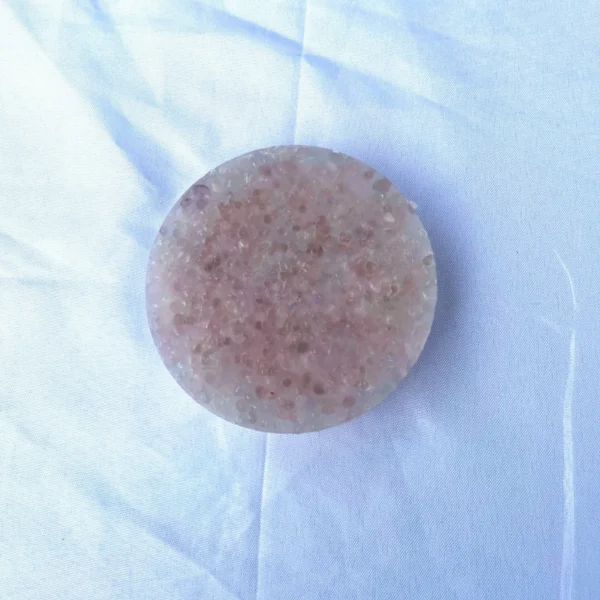 A picky pad made with rose quartz chips